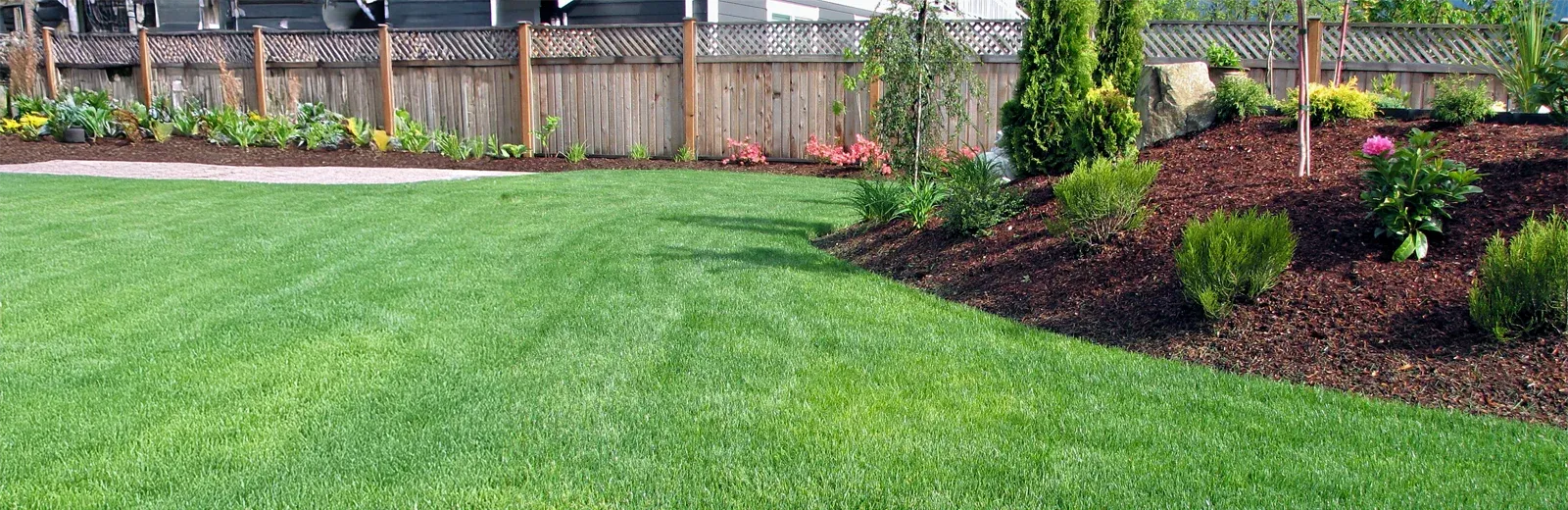 back yard and nice flower bed